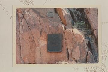 The plaque at Separation Rapid placed first near the edge of the river and removed--1934-1939, and the plaque to replace it which was placed in 1939 by Julius Stone and party. The first plaque was placed a second time 1971, Nov. 27