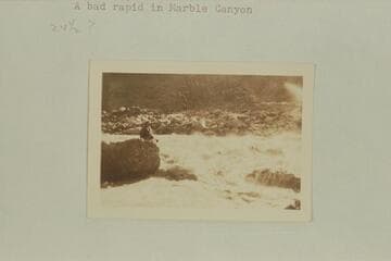 Bessie Hyde sitting next to the river
