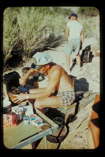 Brian grinds coffee