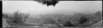 Rose Bowl Stadium and parked automobiles, Pasadena. January 1, 1925