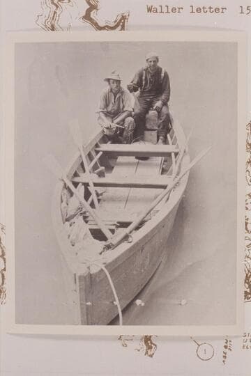 The skiff "W. H. Bradley" with McDermid and Nungesser. Built at Lees Ferry in 1910 and towed up to Mile 105 in Glen Canyon by "The Canopy," August 1910